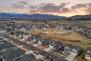 Aerial view of residential area with a mountain backdrop