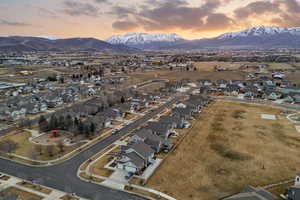 Aerial view at dusk of a residential view and a mountain view