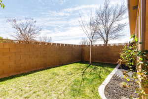View of fenced backyard