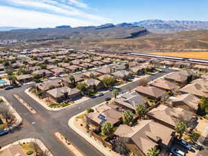Aerial view of residential area featuring mountains