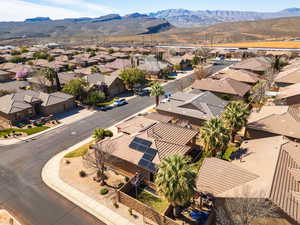Aerial view of residential area with a mountain backdrop