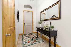 Entrance foyer featuring baseboards