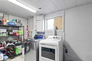 Laundry area with separate washer and dryer