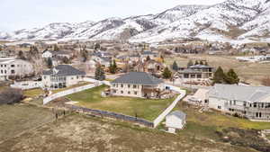 Aerial view of residential area with a mountainous background