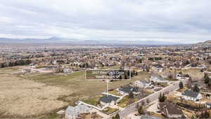 Aerial perspective of suburban area featuring mountains