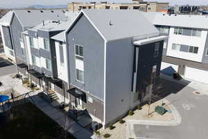 Aerial perspective of suburban area with a mountain backdrop