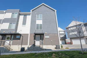 View of front facade featuring brick siding