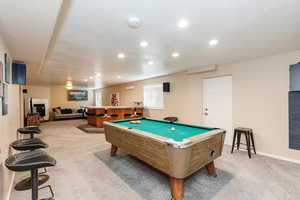 Recreation room featuring light carpet, recessed lighting, and billiards