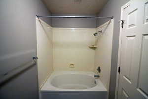 Bathroom featuring  shower combination