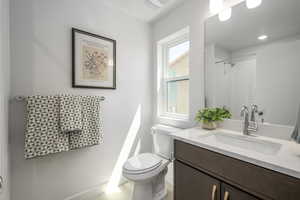 A polished secondary bath with contemporary appeal.