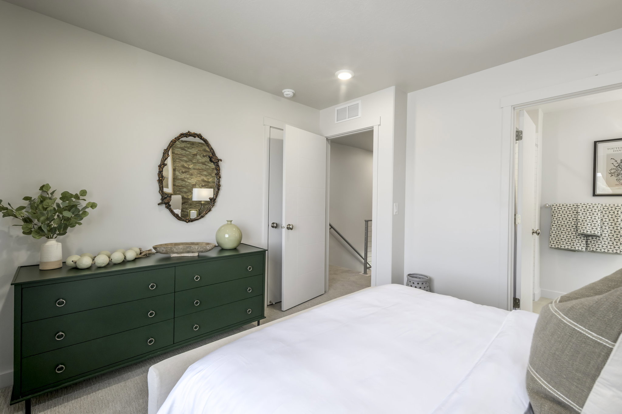 Light-toned walls with carpet flooring