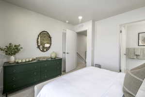 Light-toned walls with carpet flooring