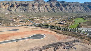 View of mountain background featuring rural landscape