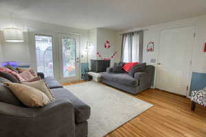 Living area featuring light wood-type flooring