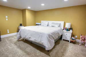 Bedroom with recessed lighting and carpet floors