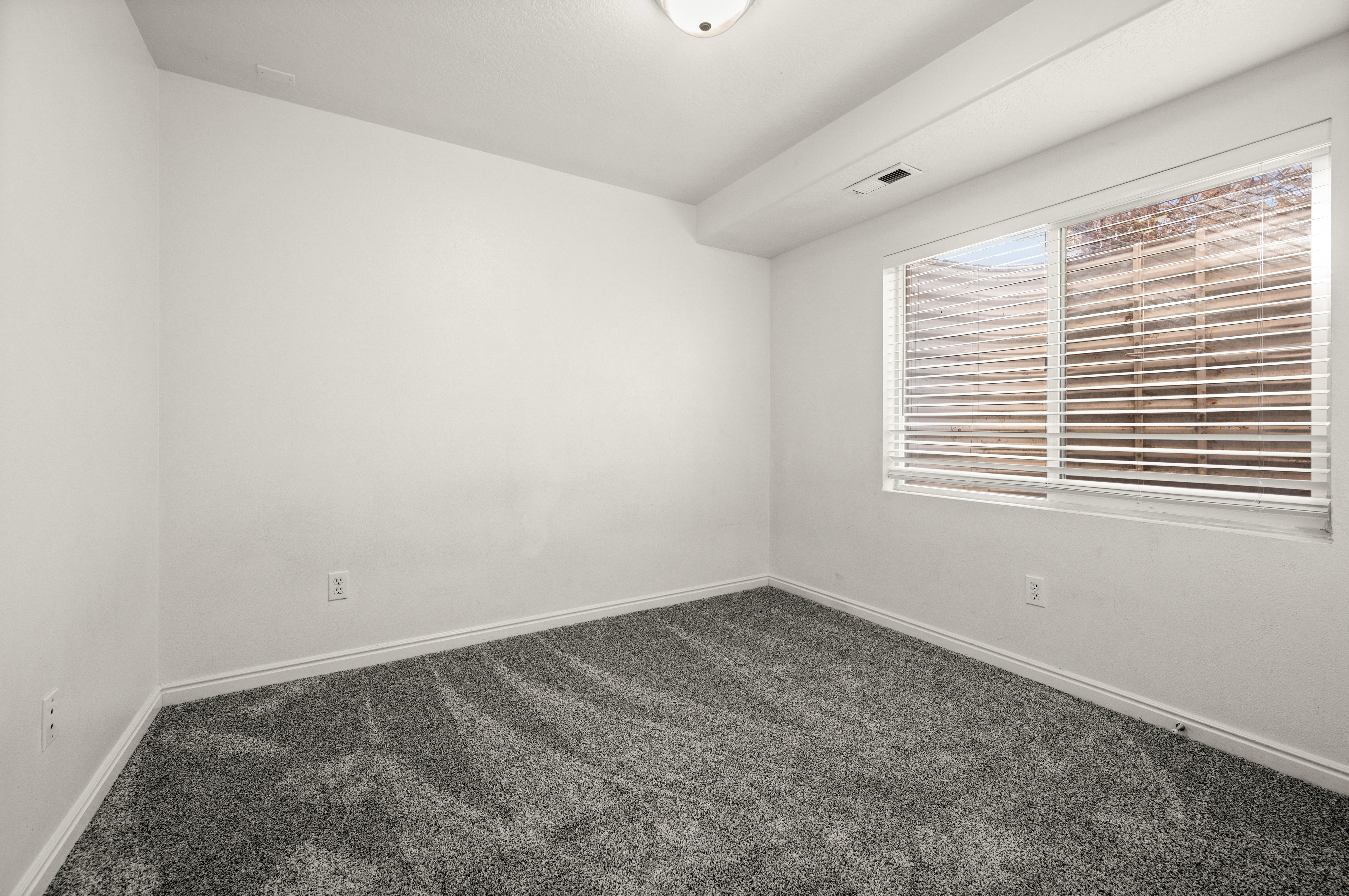 Large bedroom in basement