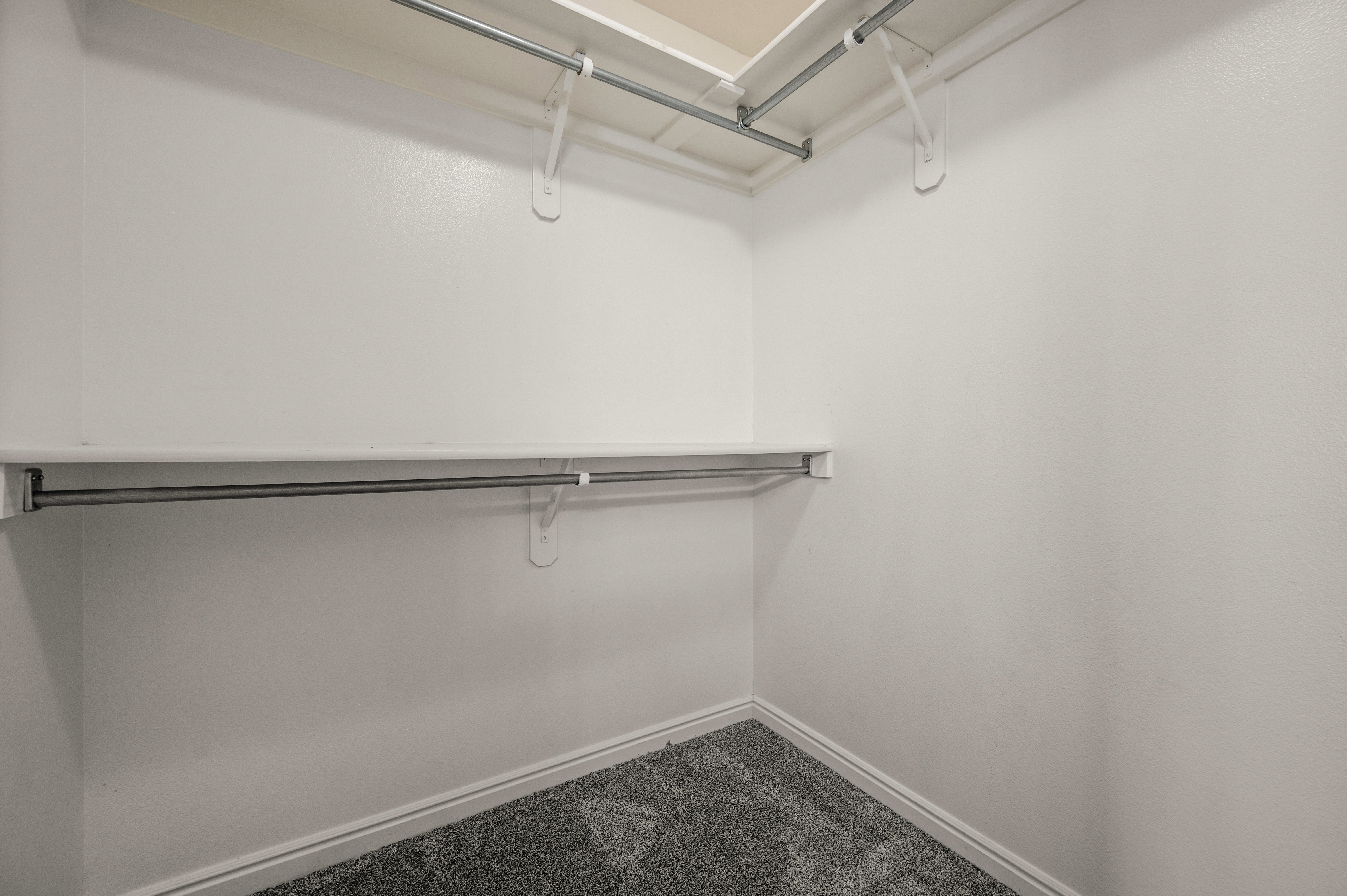 Large walk in closet in master bedroom.