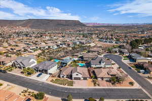 Aerial perspective of suburban area featuring mountains