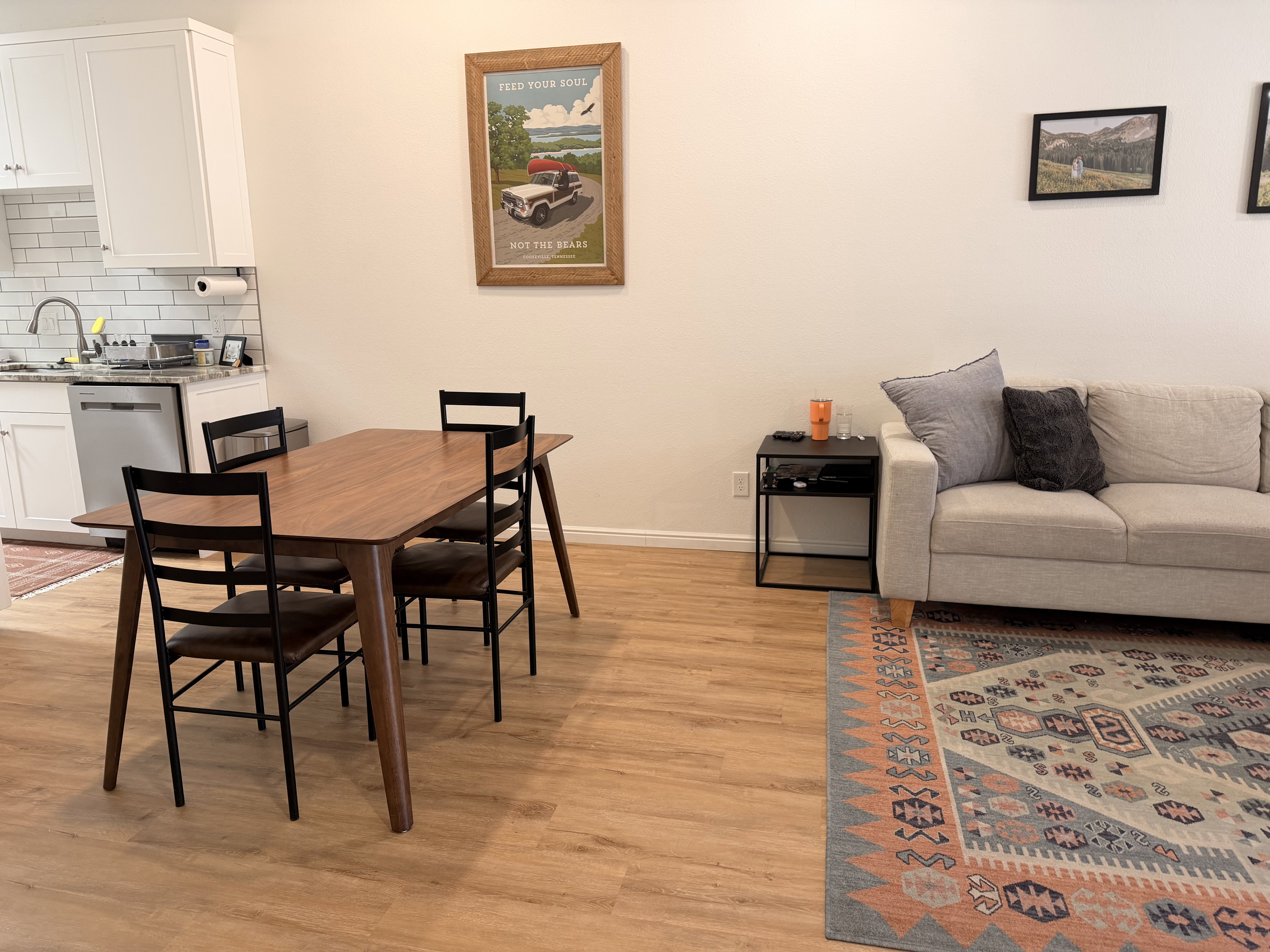 Dining room featuring light wood finished floors and baseboards