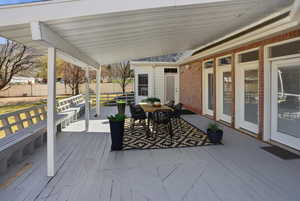 Wooden terrace with outdoor dining area