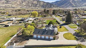 Aerial perspective of suburban area featuring a mountain backdrop