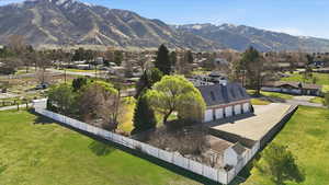 View of mountain background featuring nearby suburban area