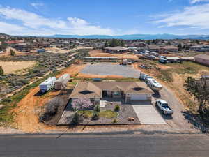 Aerial perspective of suburban area with a mountainous background