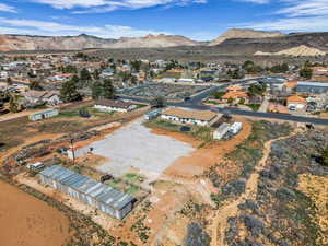 Aerial view of residential area featuring a mountain backdrop