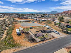 Aerial view of residential area featuring a mountain backdrop