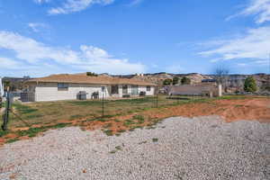 Back of house with a patio area