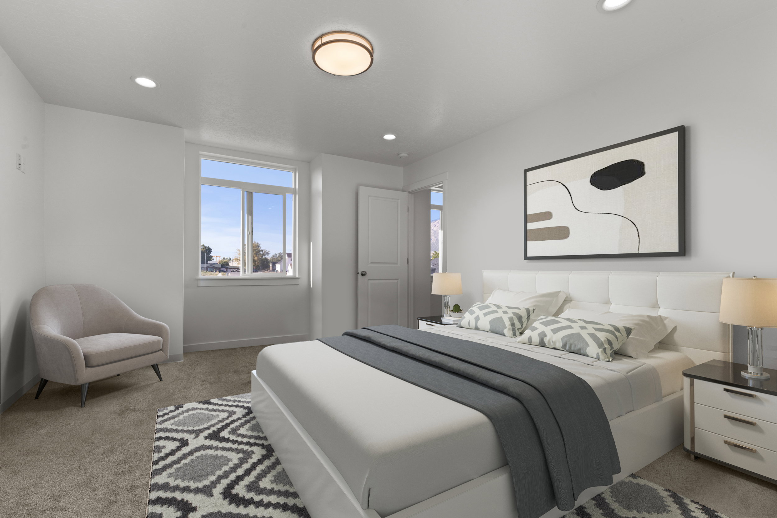 Bedroom with light carpet and baseboards
