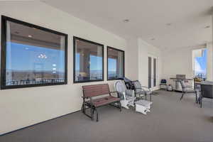 View of patio with french doors and area for grilling