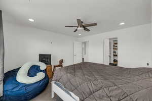 Bedroom featuring a ceiling fan and recessed lighting