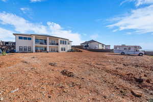 Rear view of house with stucco siding