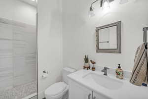 Full bathroom featuring vanity and walk in shower