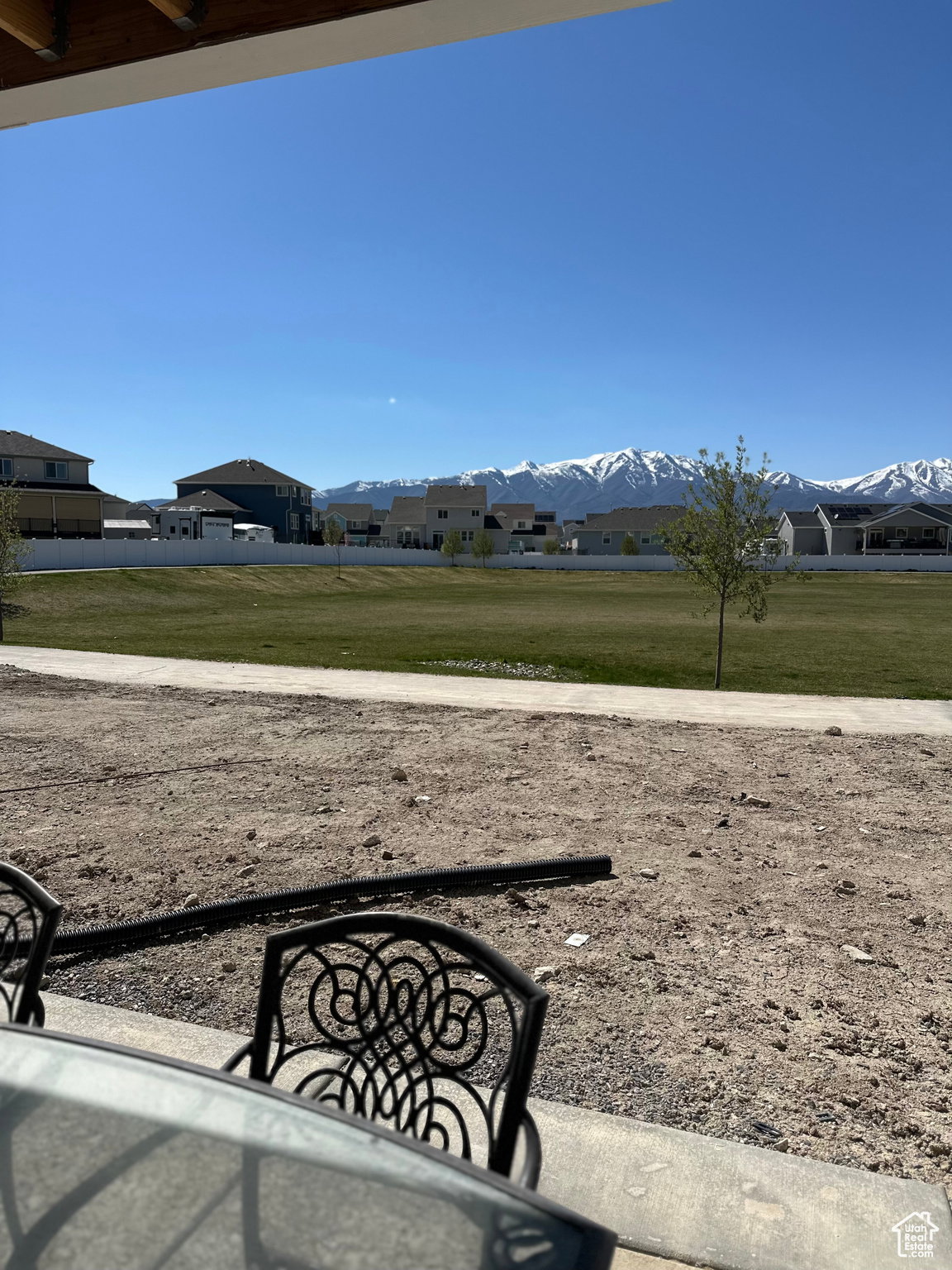 View of green lawn with a mountain view