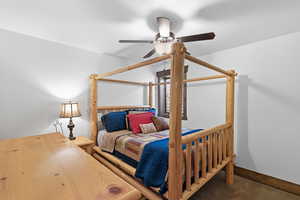 Bedroom featuring carpet floors and a ceiling fan