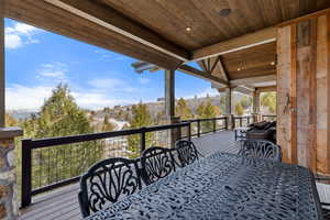 Wooden terrace with outdoor dining space