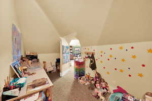 Game room featuring carpet flooring and baseboards