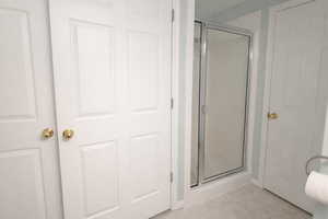 Bathroom featuring a stall shower