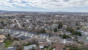 Aerial view of residential area featuring mountains