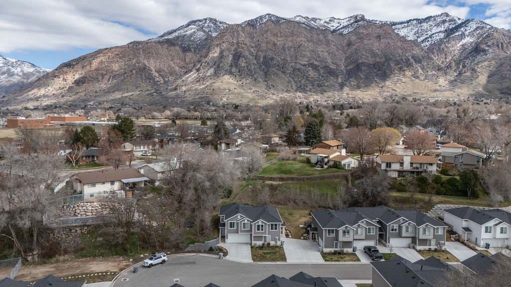 Mountain view featuring nearby suburban area