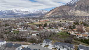 Mountain view featuring nearby suburban area