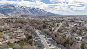Aerial view of residential area with a mountain backdrop