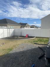 View of fenced backyard