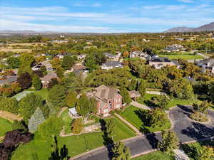 Aerial perspective of suburban area featuring mountains