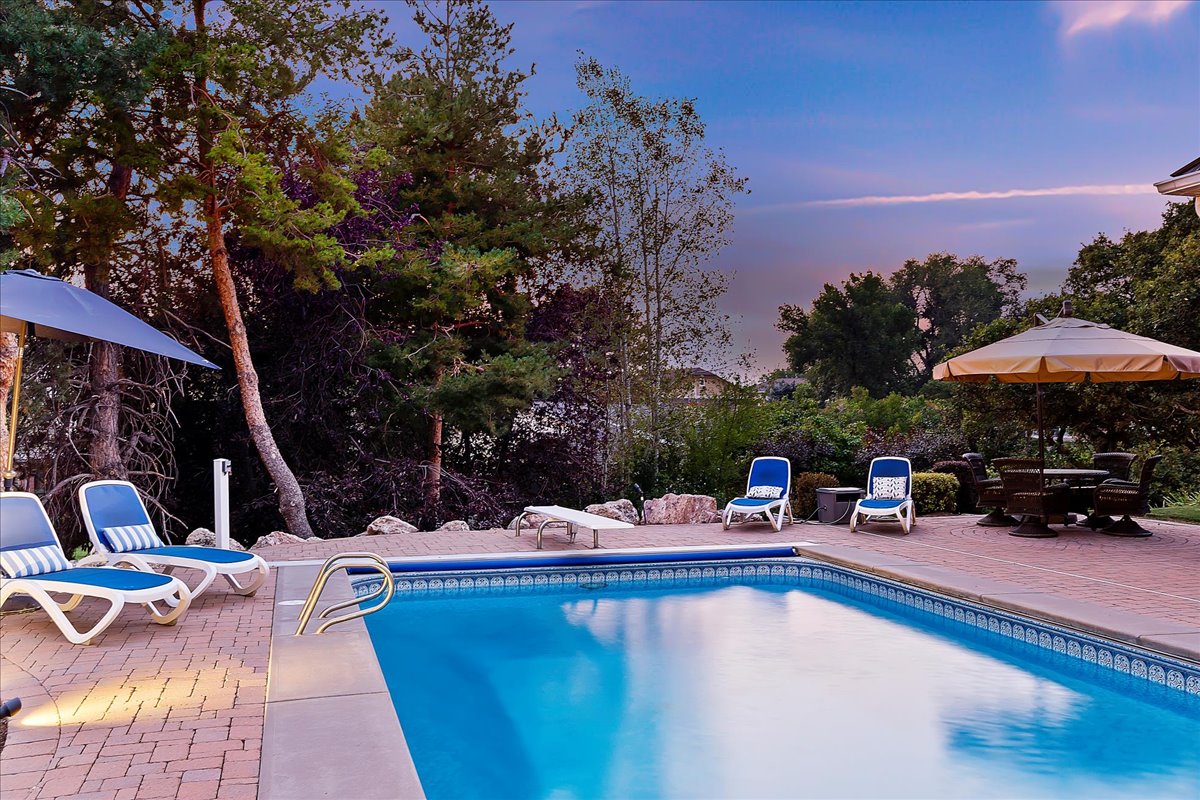 Outdoor pool with a patio area