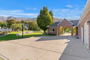 View of patio with a mountain view