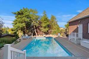 Swimming pool featuring a patio area