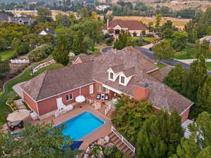 View from above of property featuring a pool area